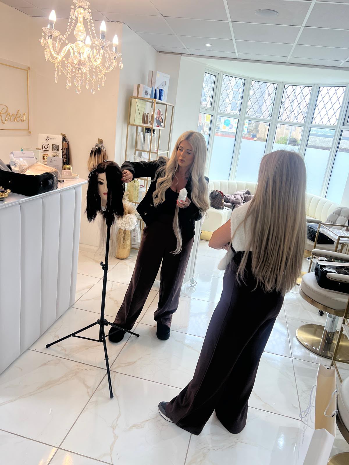 Hair extension training session at Dolly Rocks