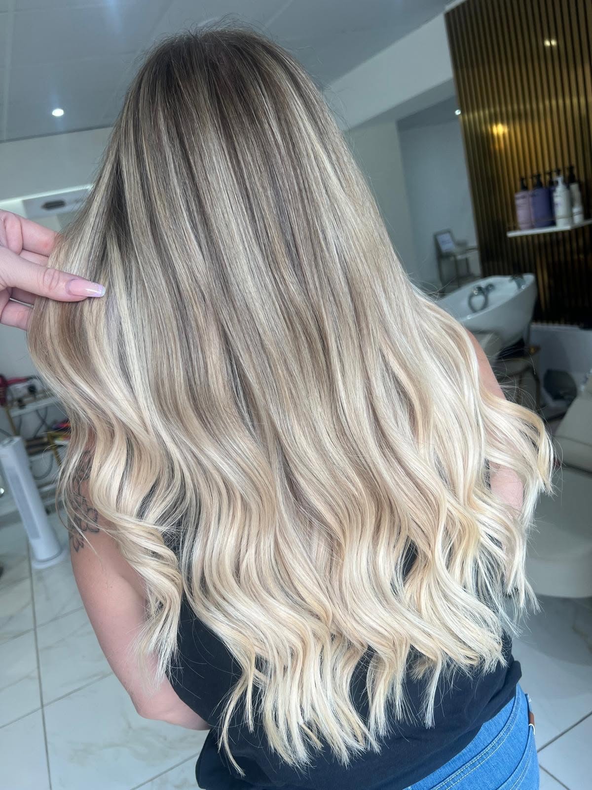 Blonde balayage colour finished at Dolly Rocks