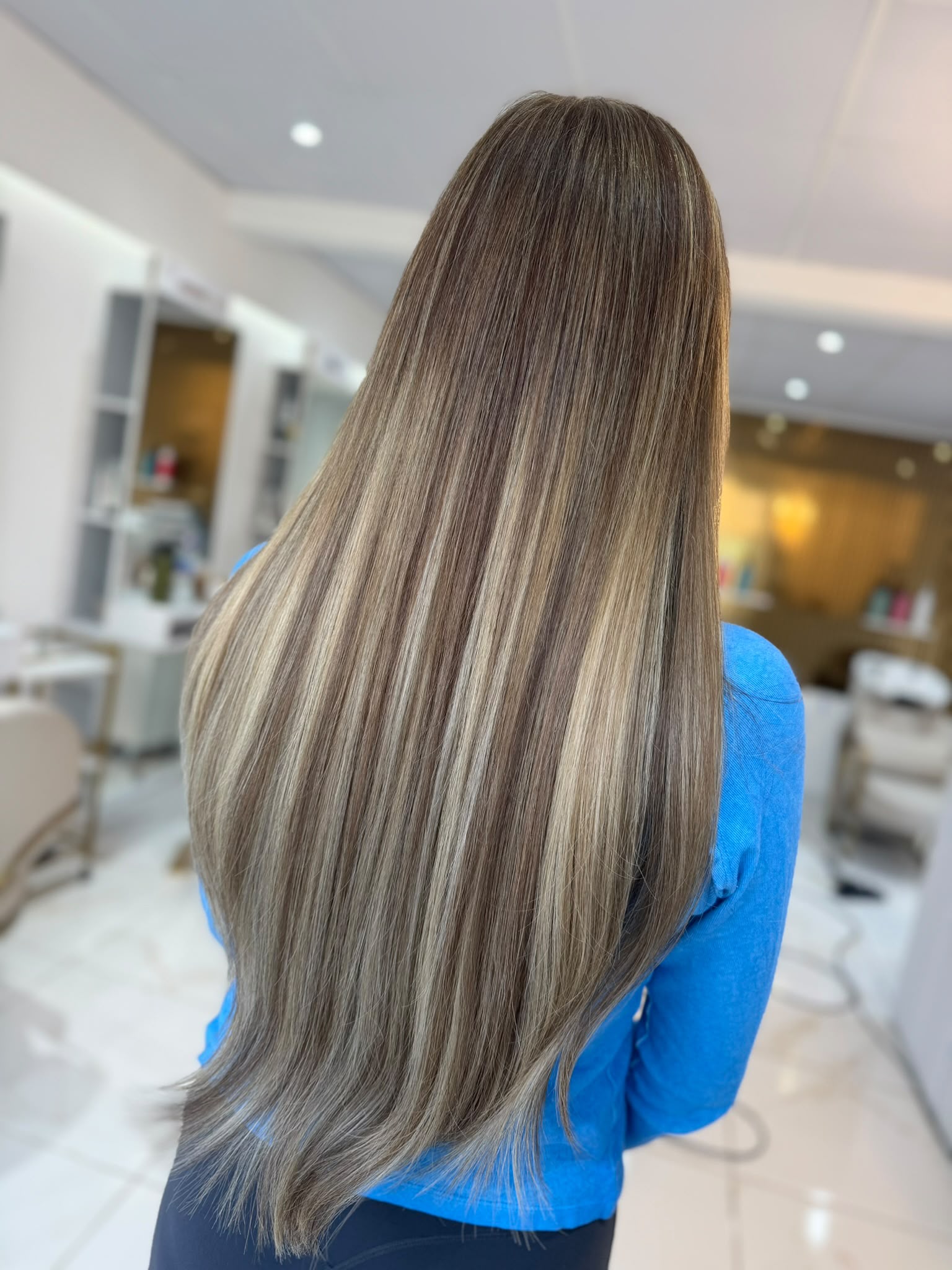 Sleek straight styling finished at Dolly Rocks