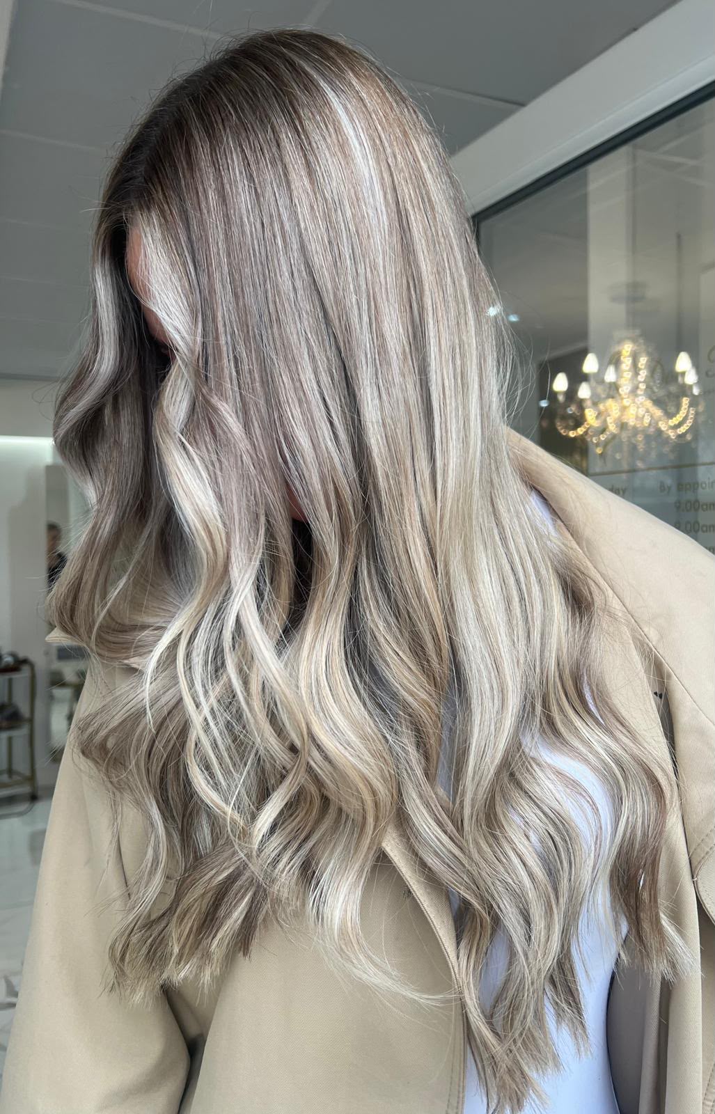 Ash blonde balayage hair extensions styled at Dolly Rocks